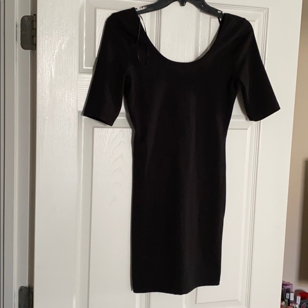 Body hugging, all black dress